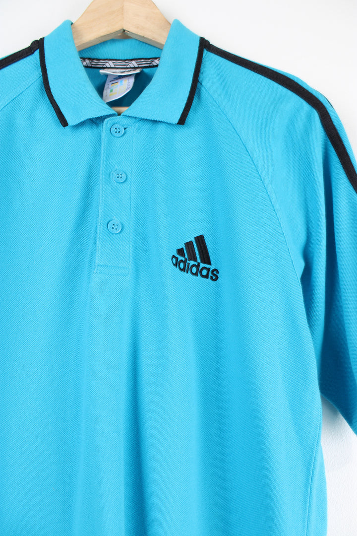 Vintage 90's Adidas blue polo shirt with embroidered Adidas logo