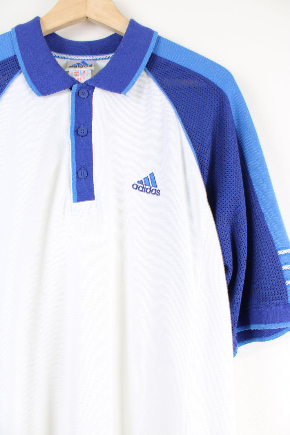 Vintage 90's Adidas white and blue Polo shirt with embroidered Adidas logo.