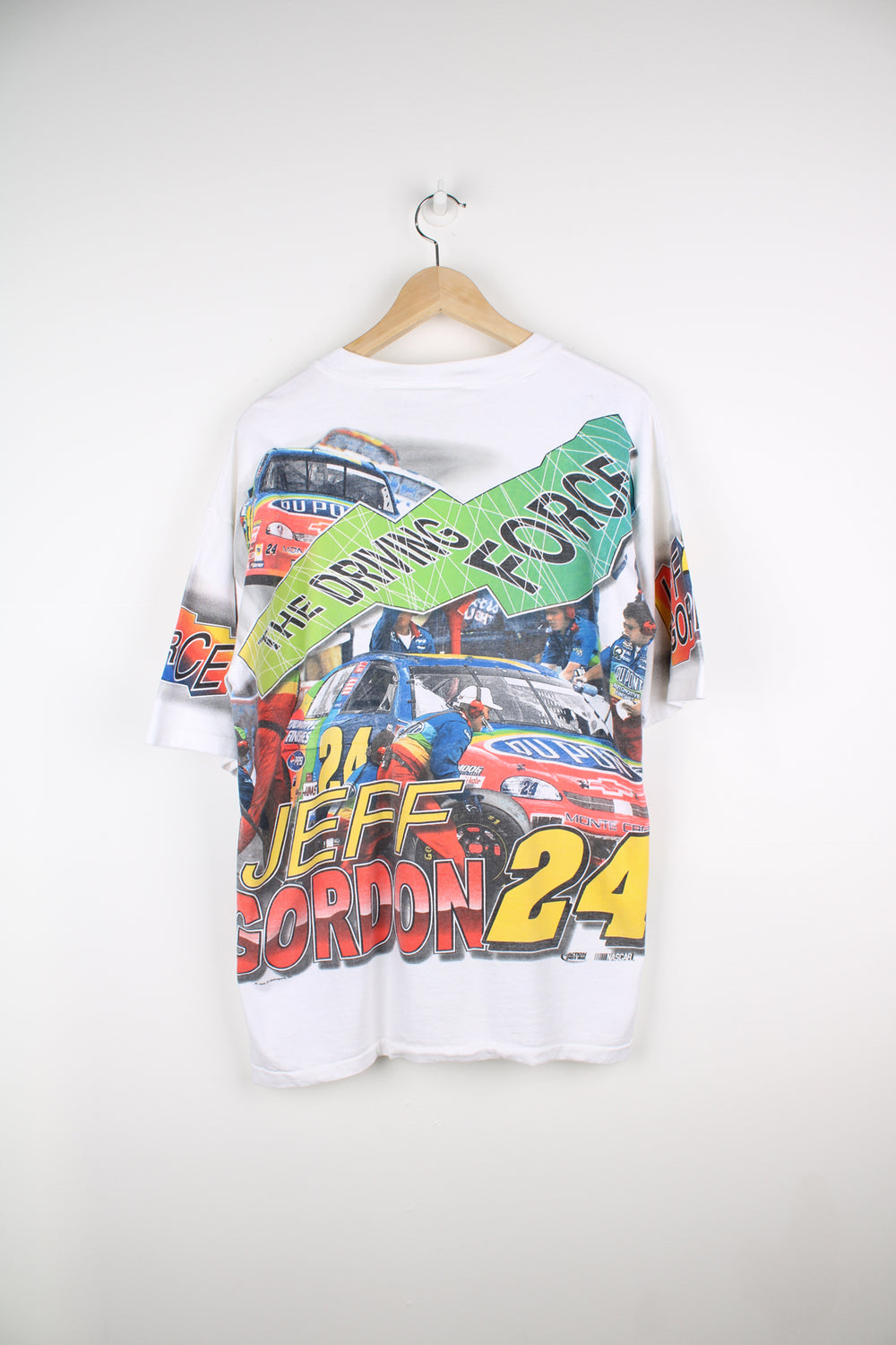 Vintage white 1990s Jeff Gordon "The Driving Force" NASCAR racing t-shirt. Features the design on the front, arms and back.  good condition Size in Label: Mens M