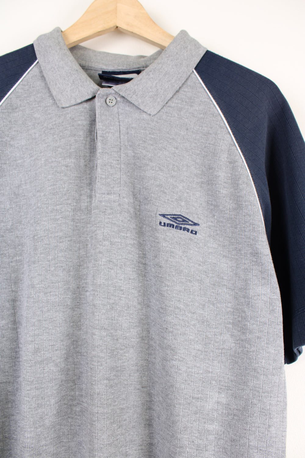 Vintage Umbro polo shirt grey and blue with embroidered logo on the chest.