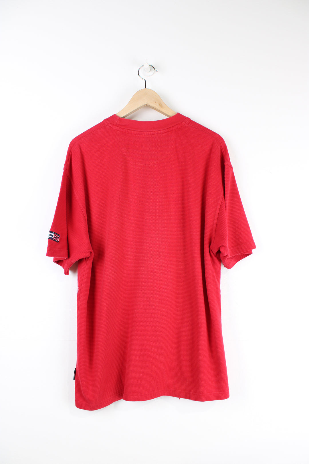 Vintage 90's Reebok red T-shirt with embroidered spell-out Reebok across the front. 