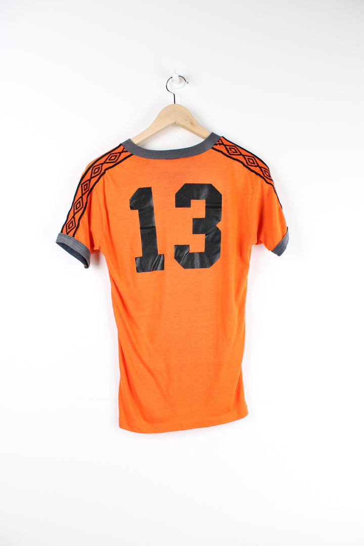 Vintage 90's Umbro sports v neck t-shirt with logo on the front and sleeve, as well as the number 13 printed on the back. 