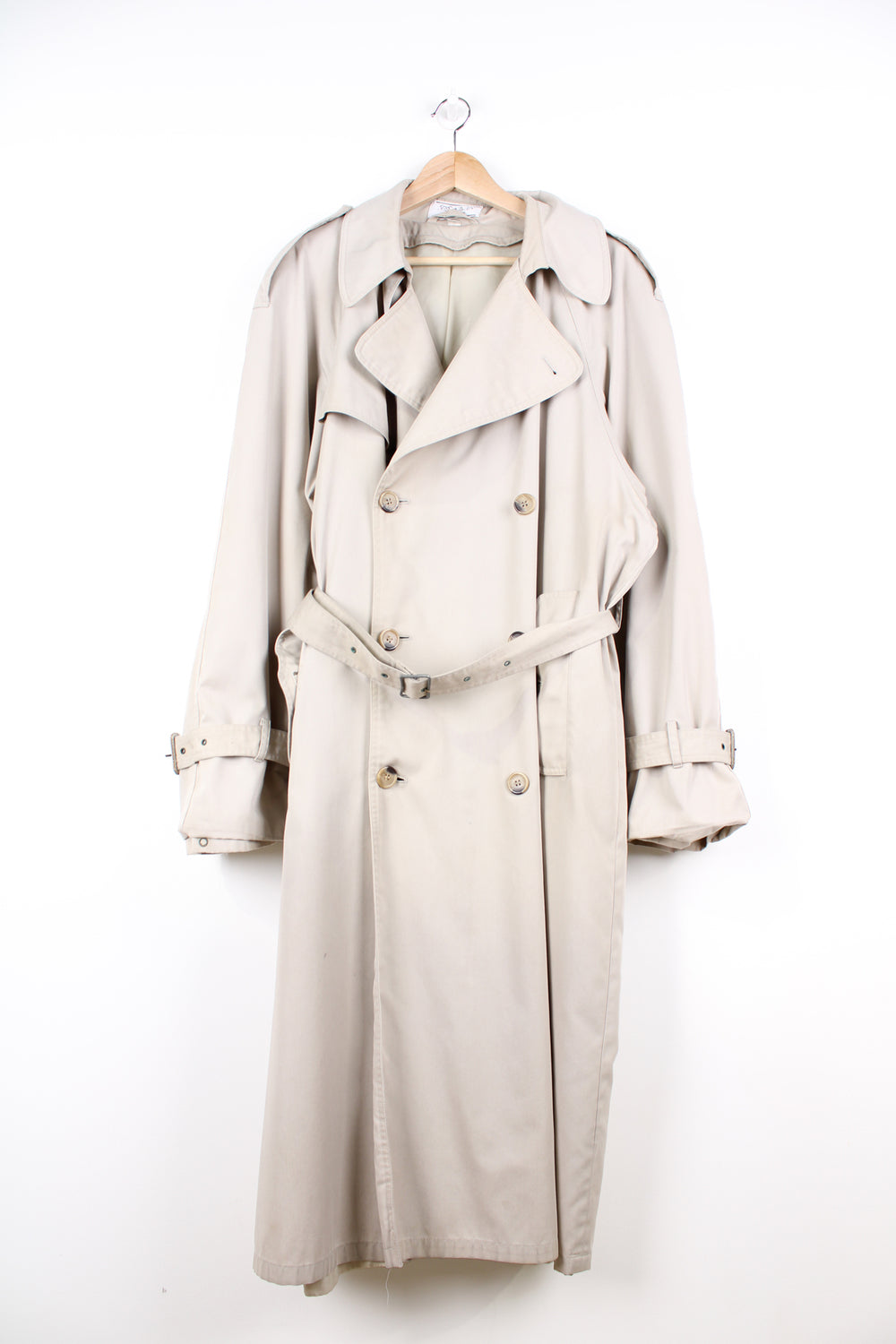 Vintage Yves Saint Laurent tan button up trench coat, features branded lining and belt 