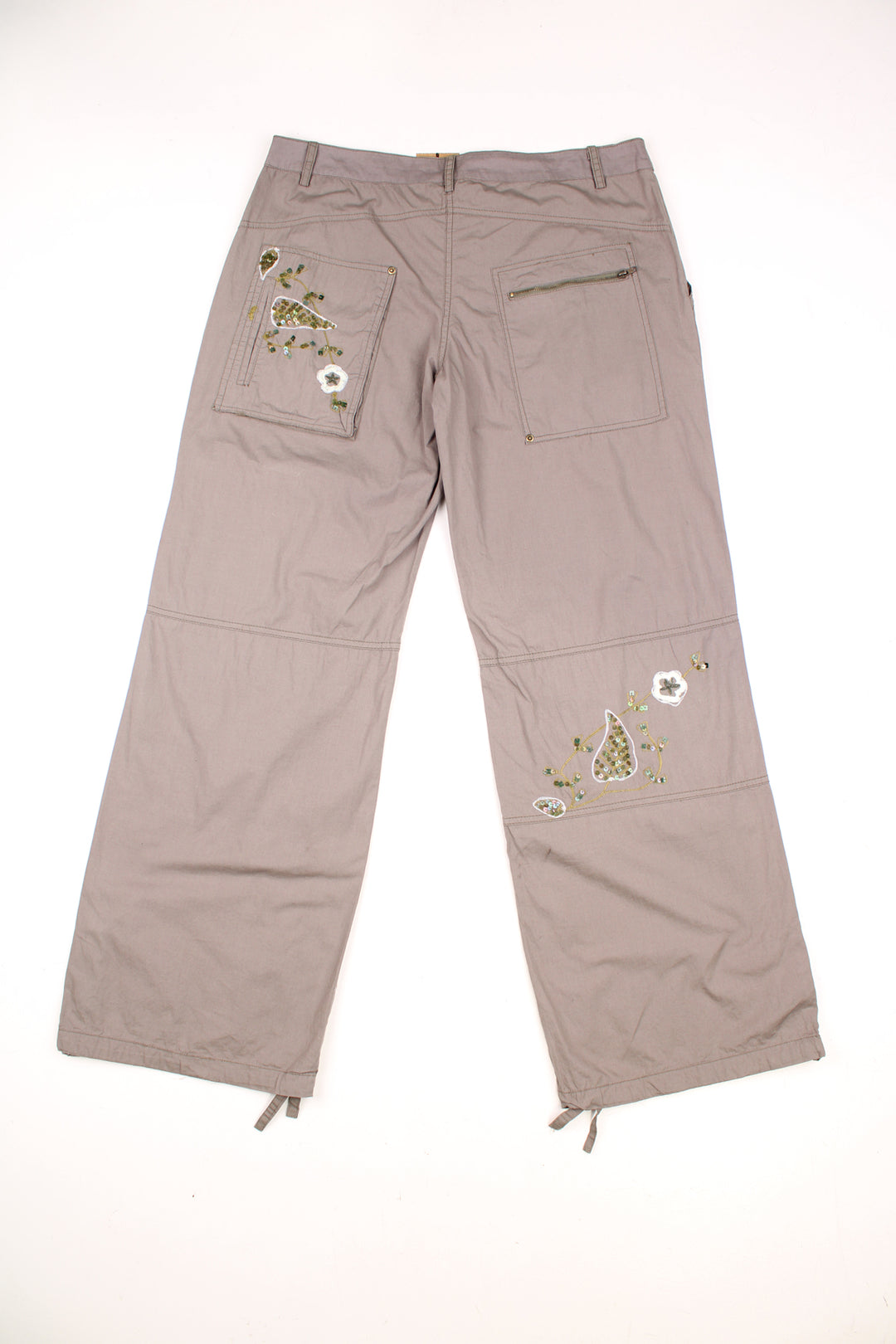 Vintage Unbranded Y2K Floral Cargo Trousers in a khaki green colourway, low rise, multiple pockets, and has floral designs embroidered with beads throughout the trousers.