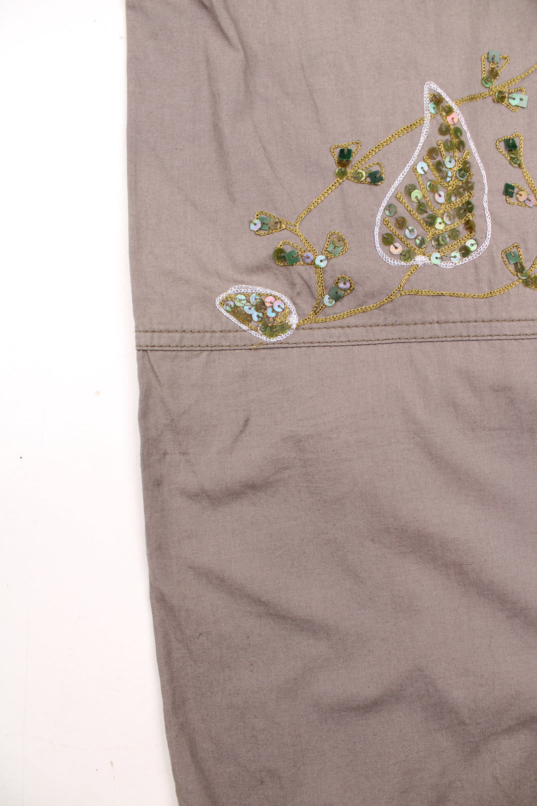 Vintage Unbranded Y2K Floral Cargo Trousers in a khaki green colourway, low rise, multiple pockets, and has floral designs embroidered with beads throughout the trousers.