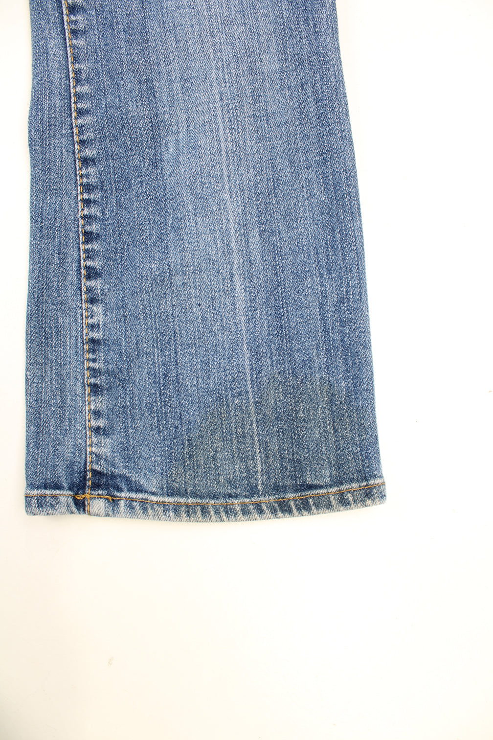 Vintage Miss Sixty Y2K Jeans in a blue colourway, low rise, multiple pockets and has the logo embroidered on the front and back.