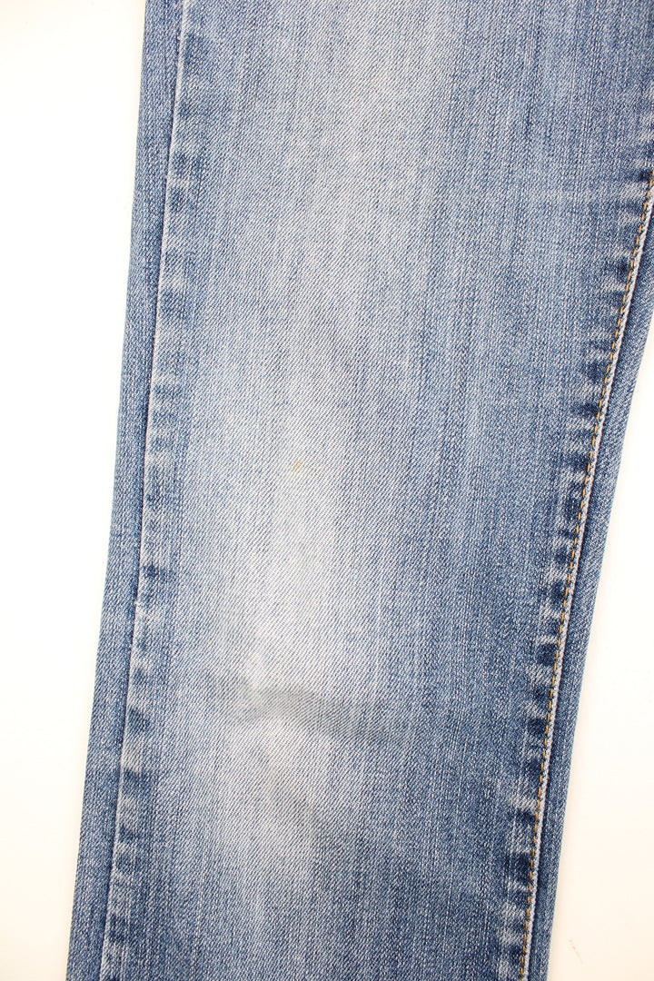 Vintage Miss Sixty Y2K Jeans in a blue colourway, low rise, multiple pockets and has the logo embroidered on the front and back.