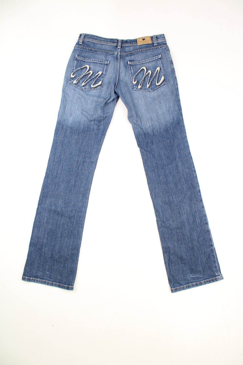 Y2K Morgan Jeans in a blue colourway, low rise, multiple pockets, and has the spell out logo embroidered on both back pockets.