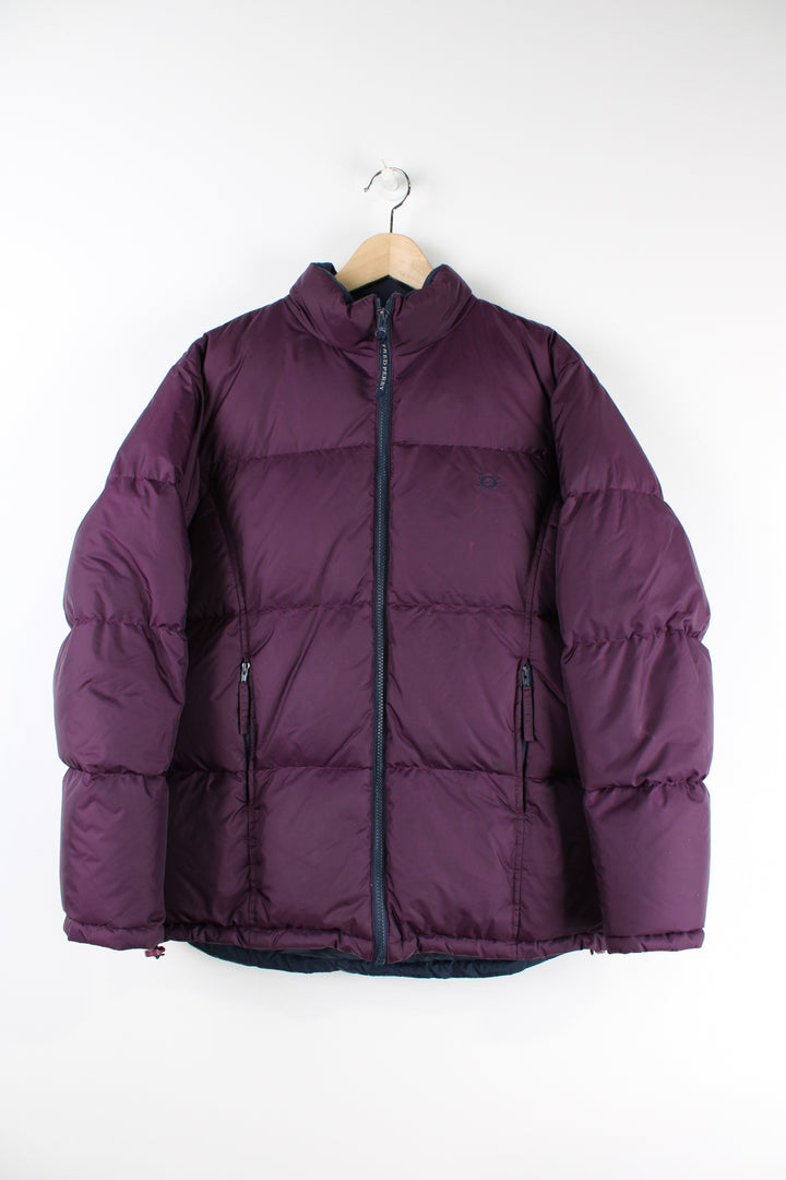 Fred Perry purple puffer jacket features embroidered logo on the chest and drawstring hem