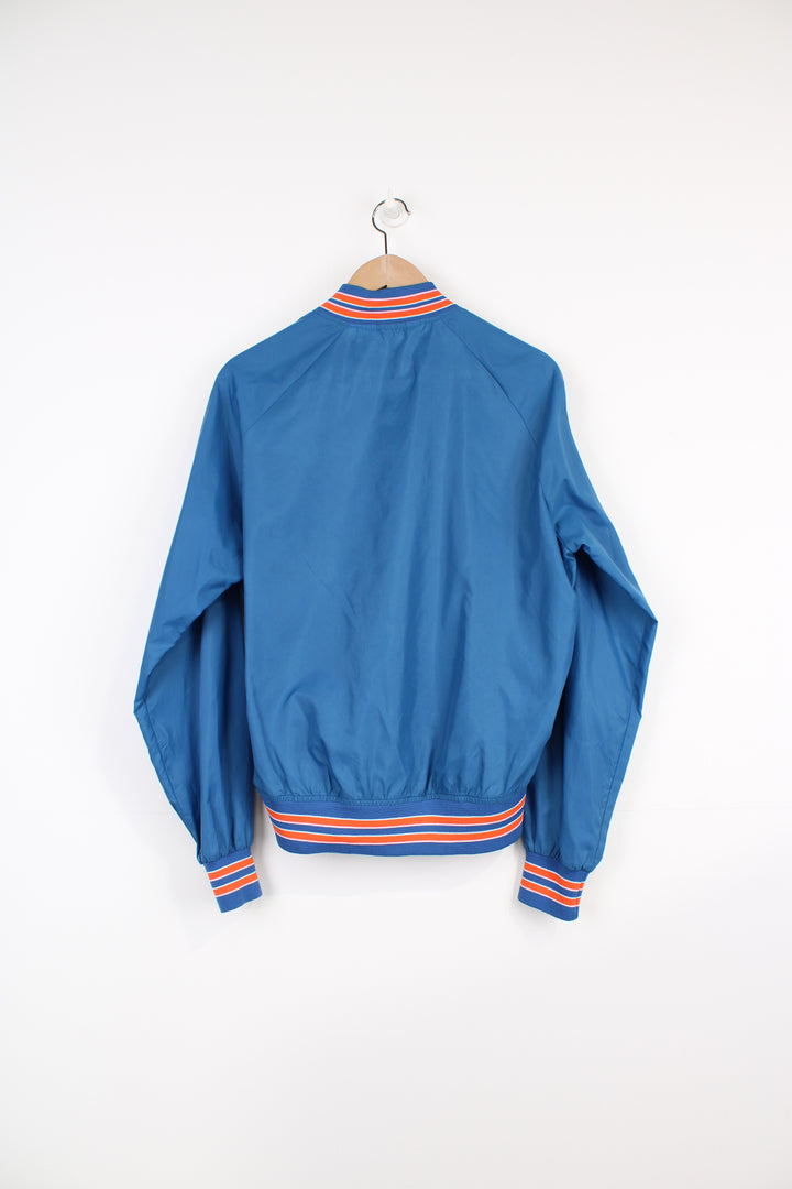 Vintage 90's Florida Gators thin varsity bomber Jacket, from Chalk Line by. Features embroidered Gators logo on the chest and closes with snap buttons down the front.  Size in Label: Mens M