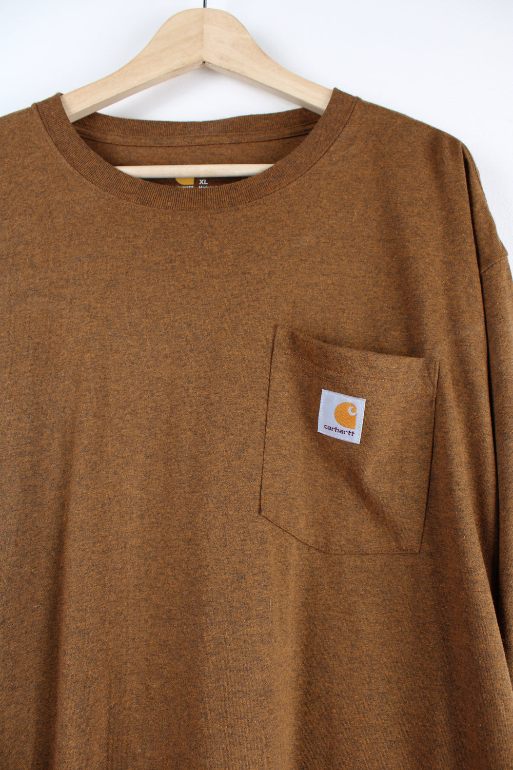 Carhartt long sleeved t-shirt in brown with branded chest pocket.