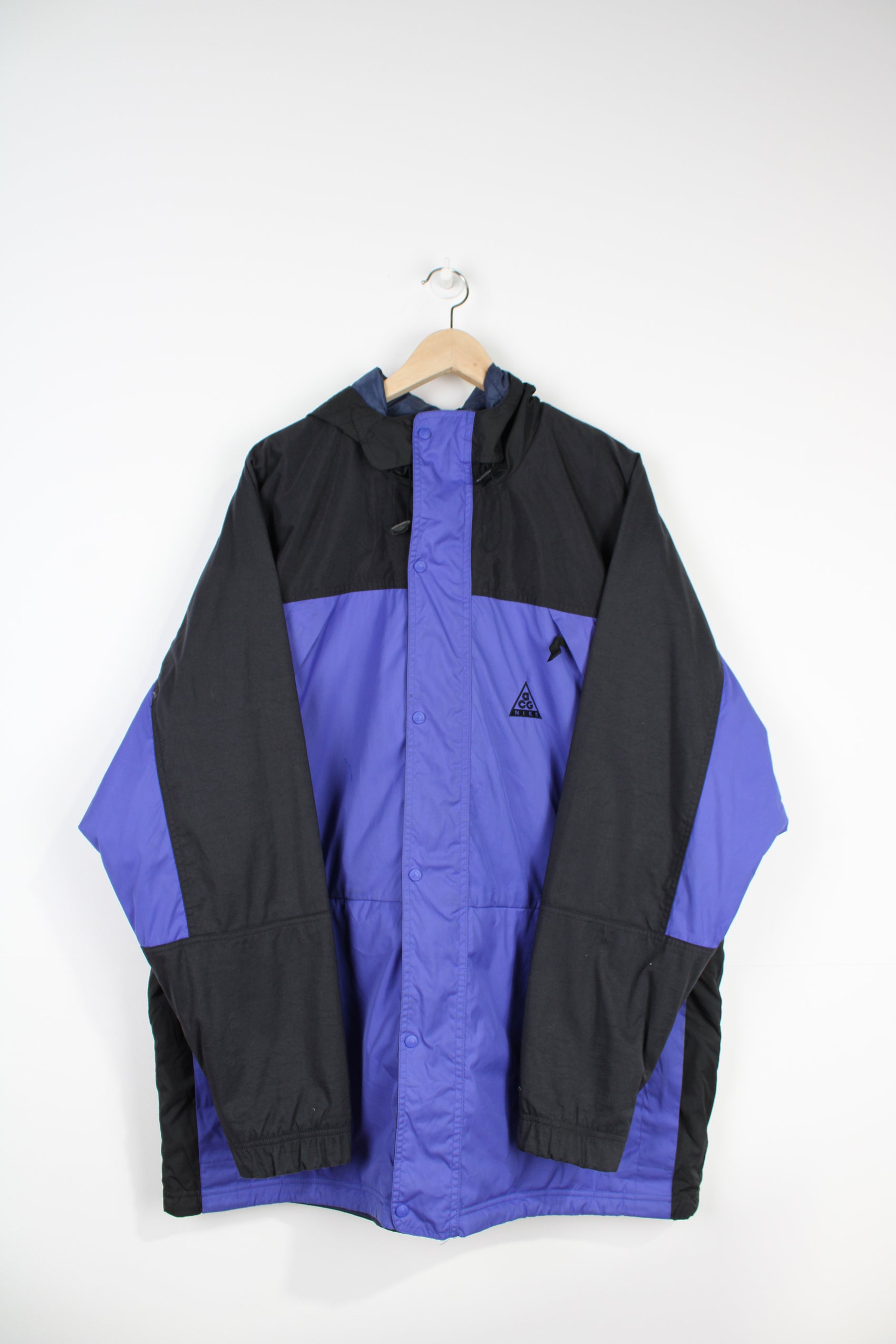 Nike ACG blue/purple and black outdoor coat with hood and multiple pockets