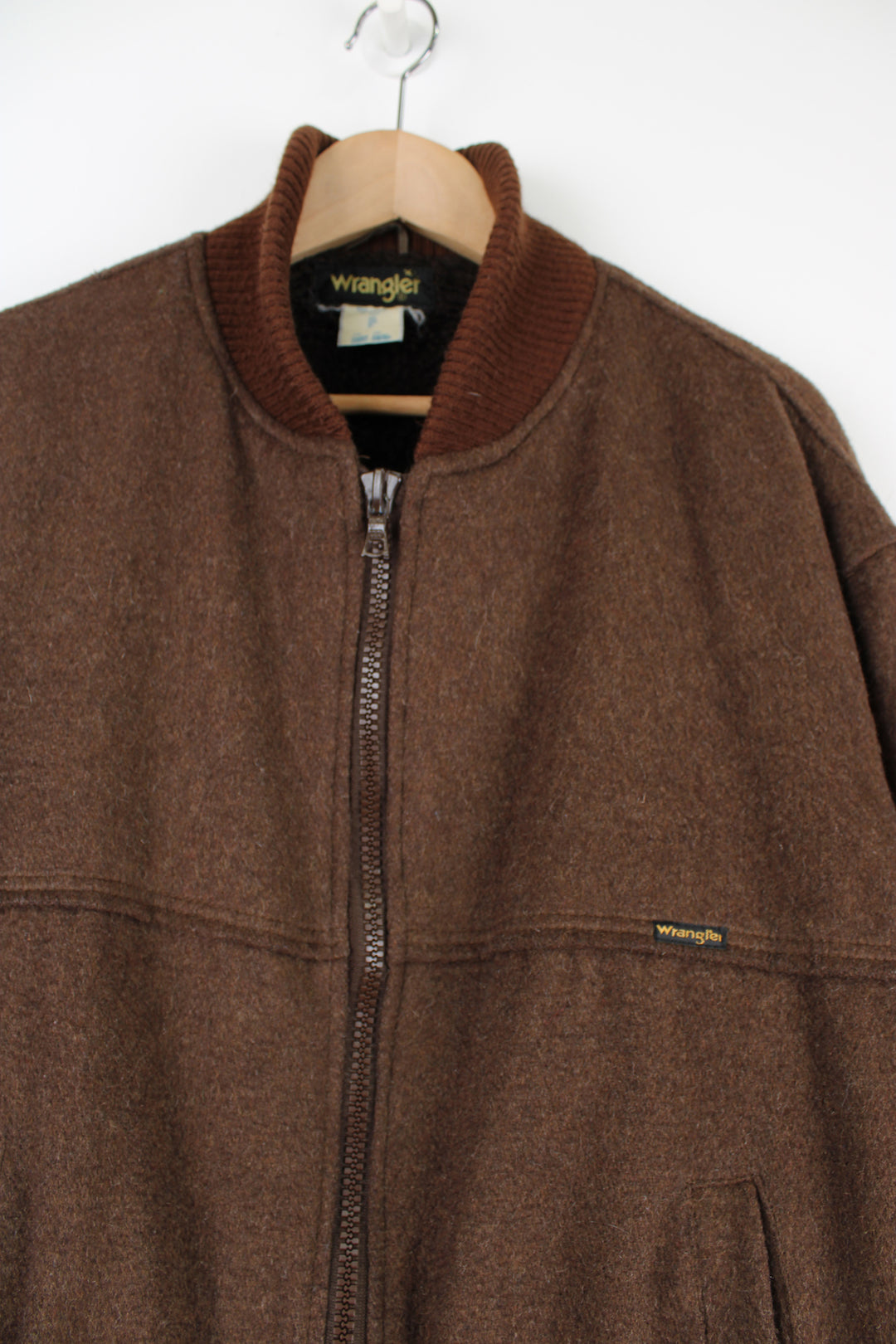 Vintage Wrangler brown wool bomber, zip through bomber jacket. Features western style yoke on the front and back, faux shearling lining and wrangler tab logo on the chest