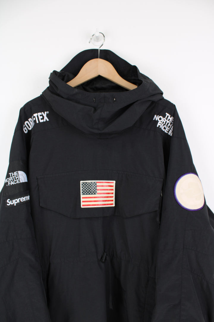 Supreme x The North Face Trans Antarctica expedition pullover jackets, features decorative patches featuring the US flag