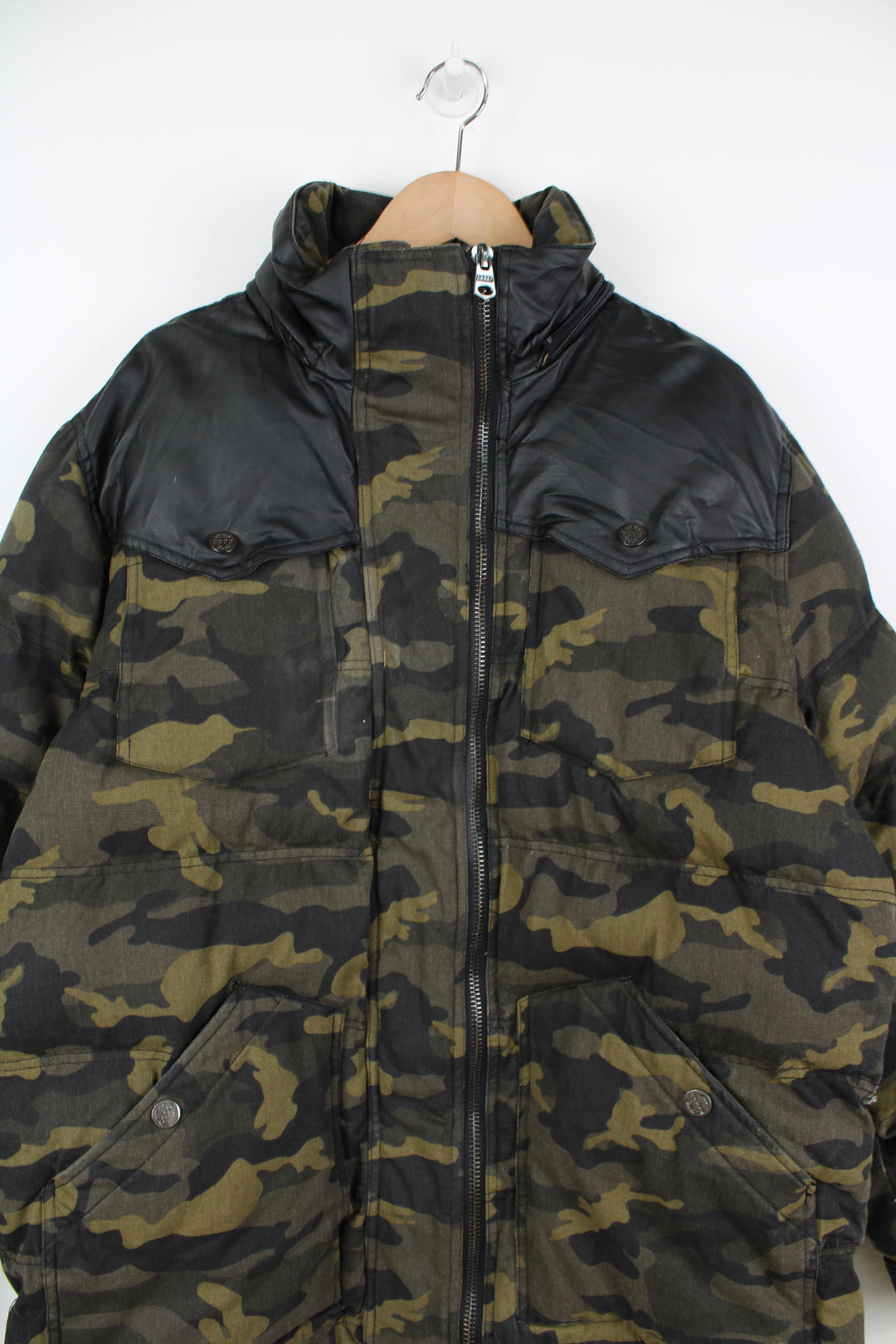 Coogi camouflage zip through puffer coat, features circular badge on the sleeve and multiple pockets 