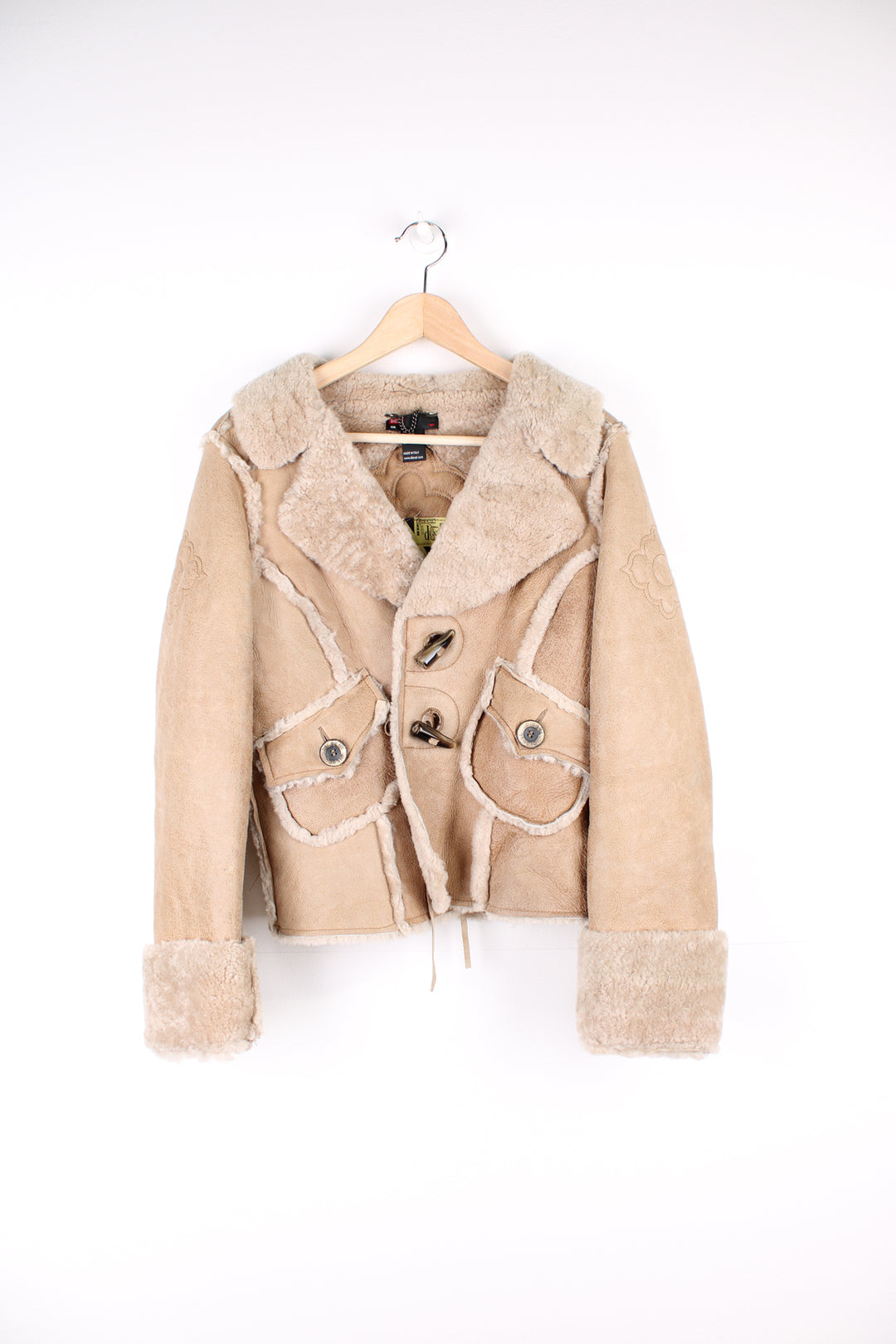 Diesel chunky cropped shearling jacket with toggle buttons and embroidered floral details on the back and shoulders