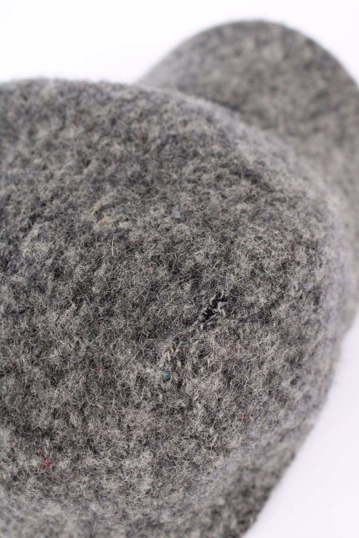 Kangol grey wool cap, features embroidered spell-out logo on the front 