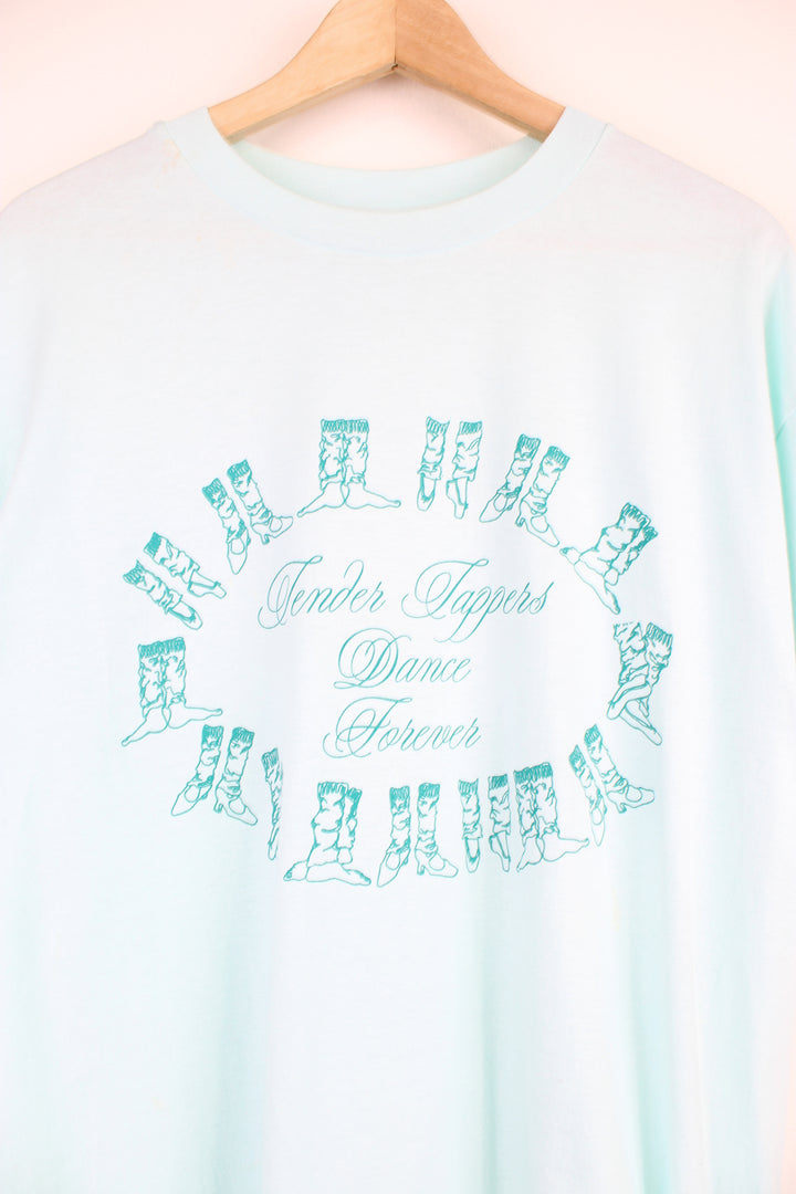 Vintage 'Tender Tappers Dance Forever' baby blue single stitch t-shirt with printed graphic on the front, made in the USA by Hanes