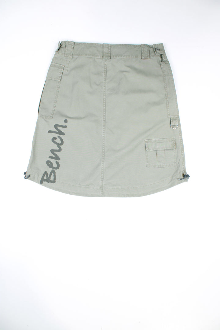 Vintage Y2K khaki green Bench skirt. Low rise cargo style.  good condition  Size in label:   34  Our Measurements:  Waist: 36 inches (to be worn on hips) Length: 22 inches