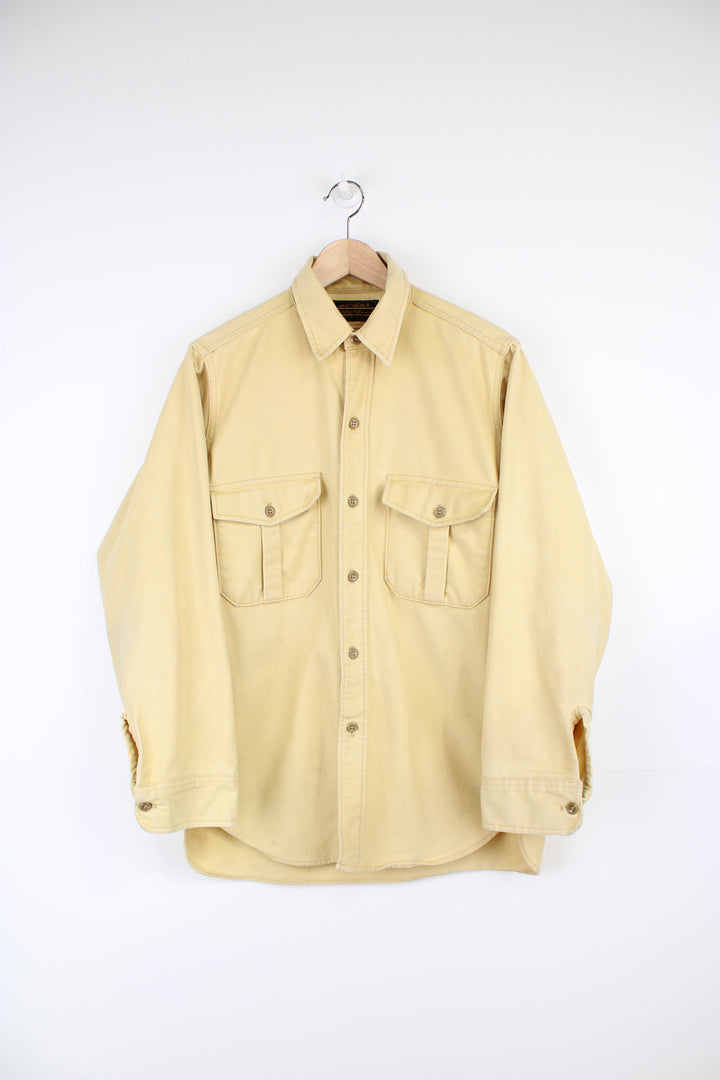 Vintage pale yellow cotton work shirt by Eddie Bauer, made in the USA  