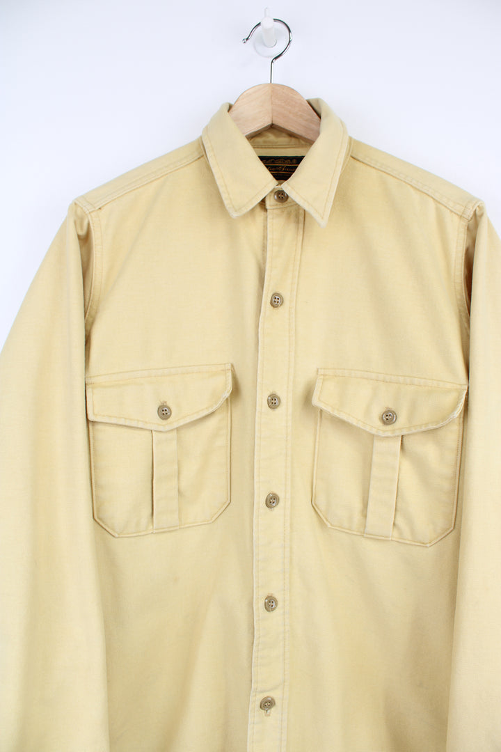 Vintage pale yellow cotton work shirt by Eddie Bauer, made in the USA  