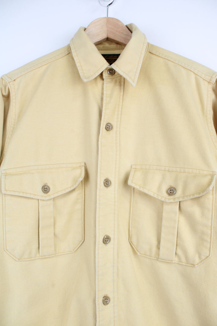 Vintage pale yellow cotton work shirt by Eddie Bauer, made in the USA  