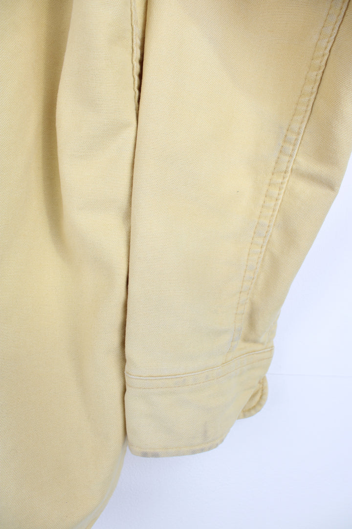 Vintage pale yellow cotton work shirt by Eddie Bauer, made in the USA  