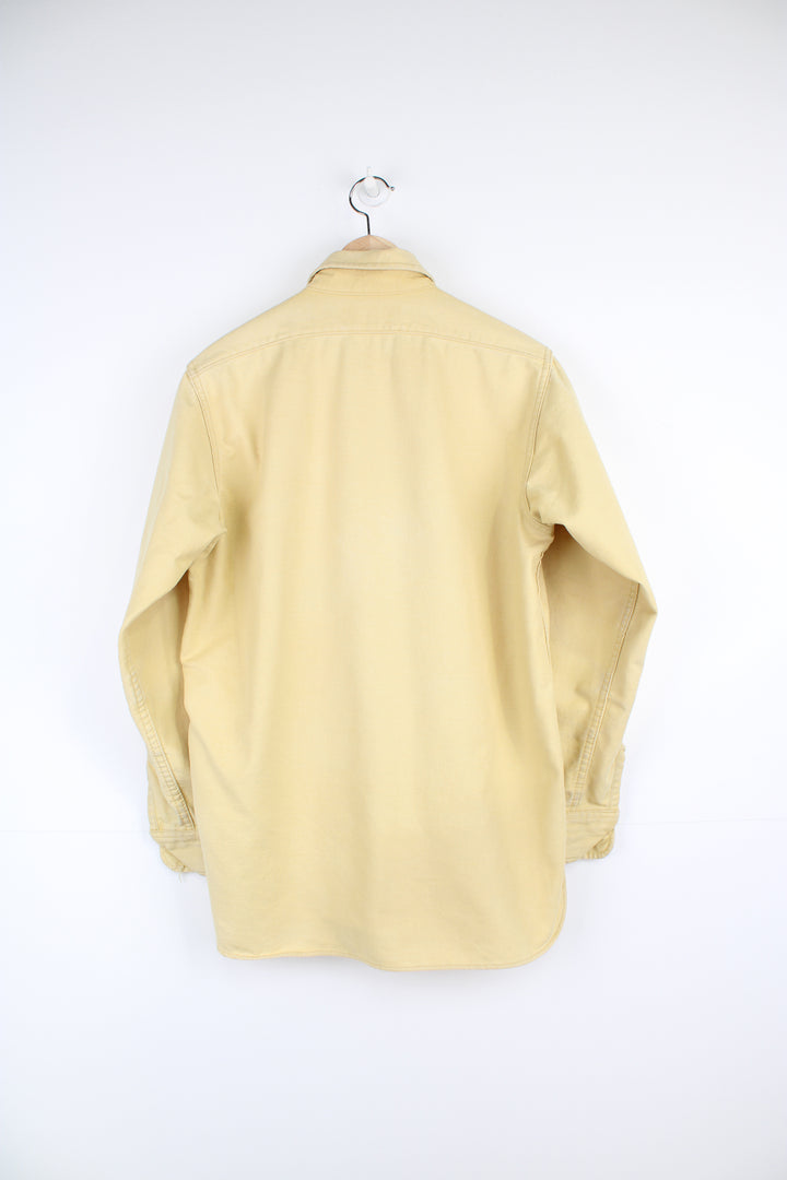 Vintage pale yellow cotton work shirt by Eddie Bauer, made in the USA  