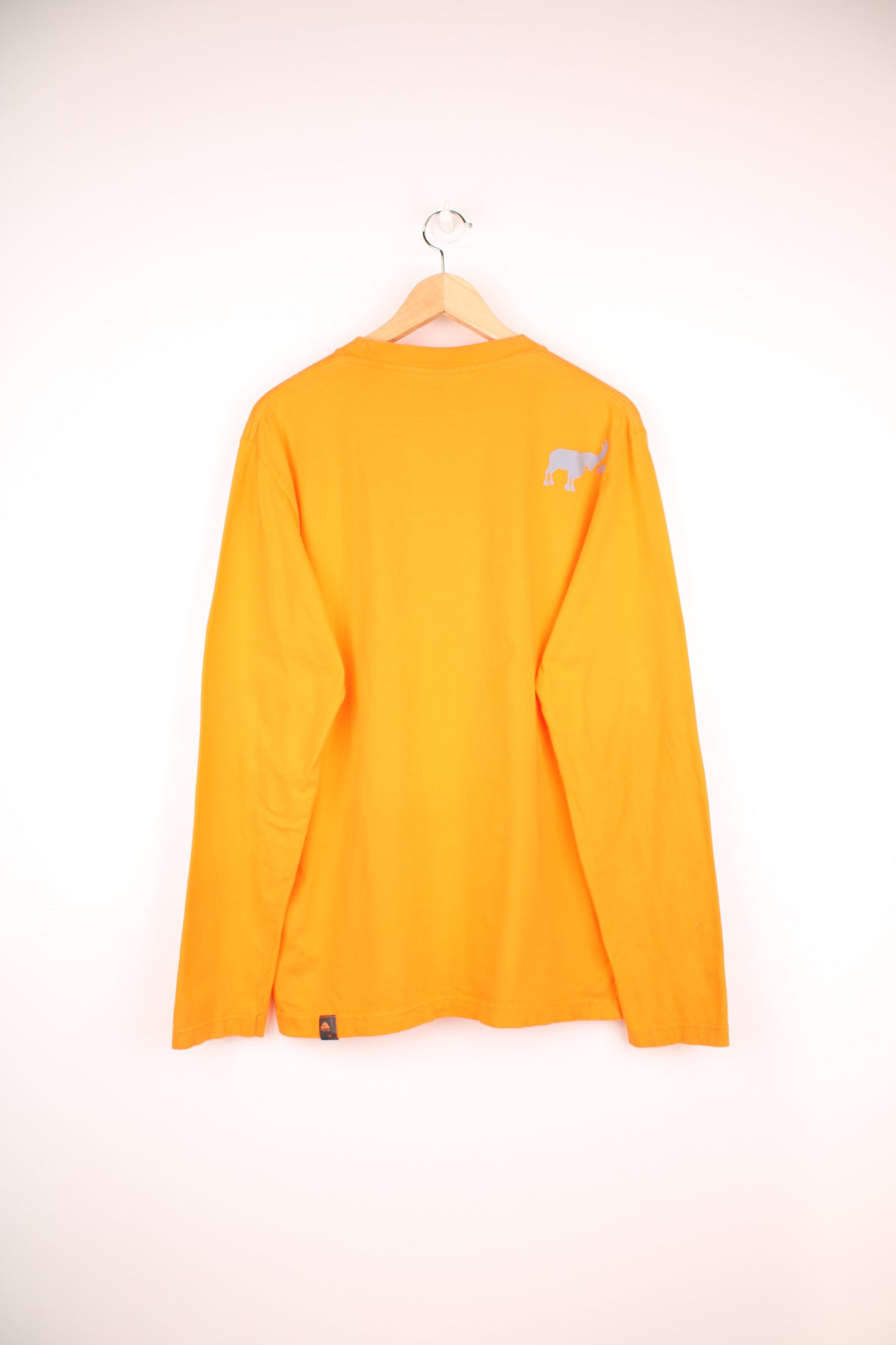 Nike ACG Long Sleeved T-Shirt in a orange and grey colourway, and has a elephant graphic design printed alongside the logo on the front and back.