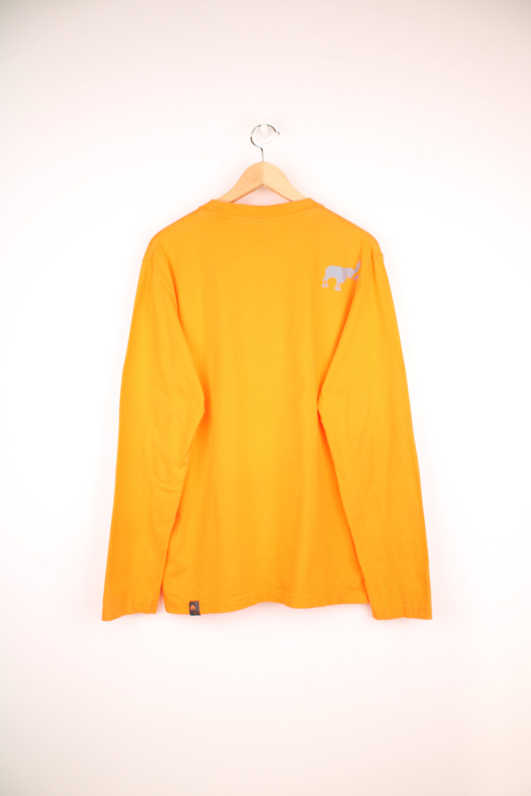 Nike ACG Long Sleeved T-Shirt in a orange and grey colourway, and has a elephant graphic design printed alongside the logo on the front and back.