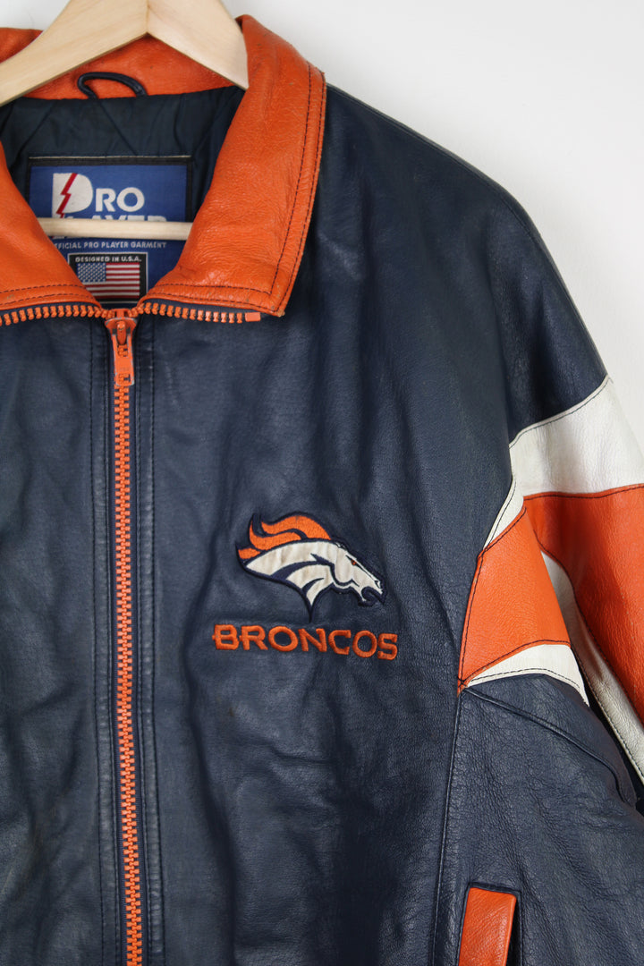 Vintage Denver Broncos zip through leather jacket By Pro Player with embroidered details on the chest and back