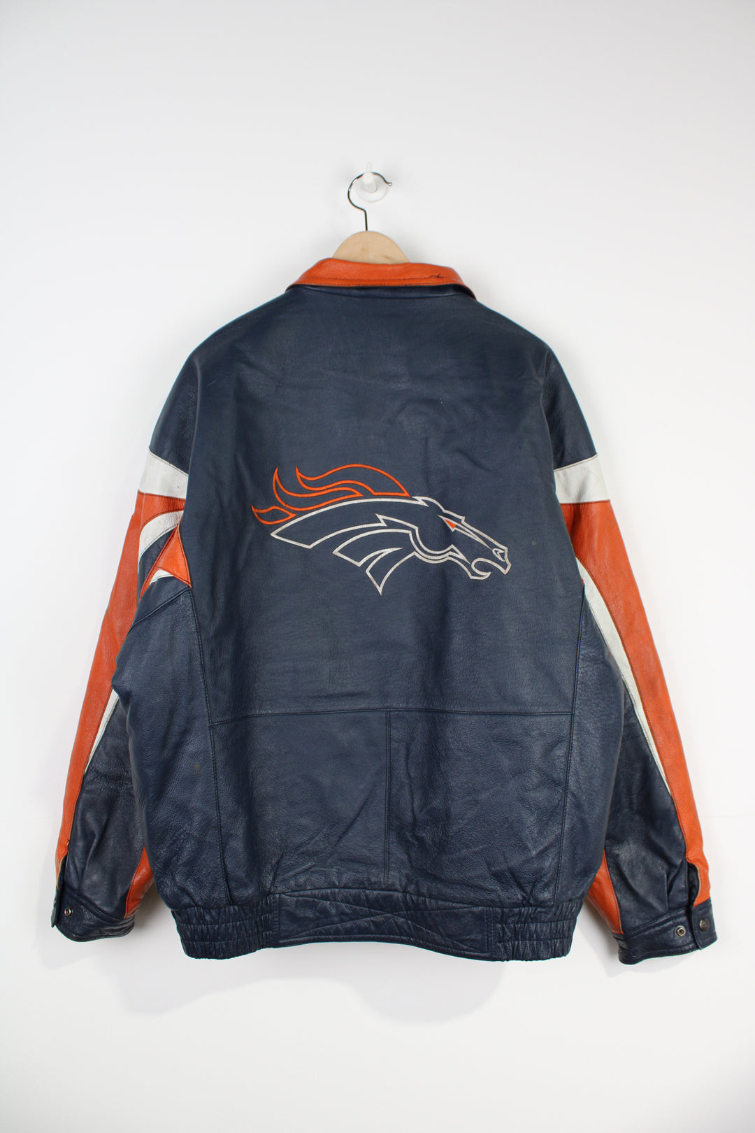 Vintage Denver Broncos zip through leather jacket By Pro Player with embroidered details on the chest and back