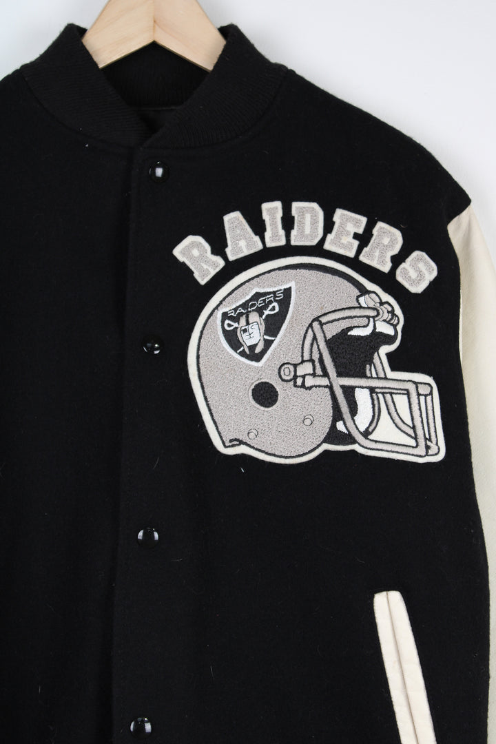 Vintage NFL Oakland Raiders Pro-Sport bomber jacket with embroidered team graphic on the front and back