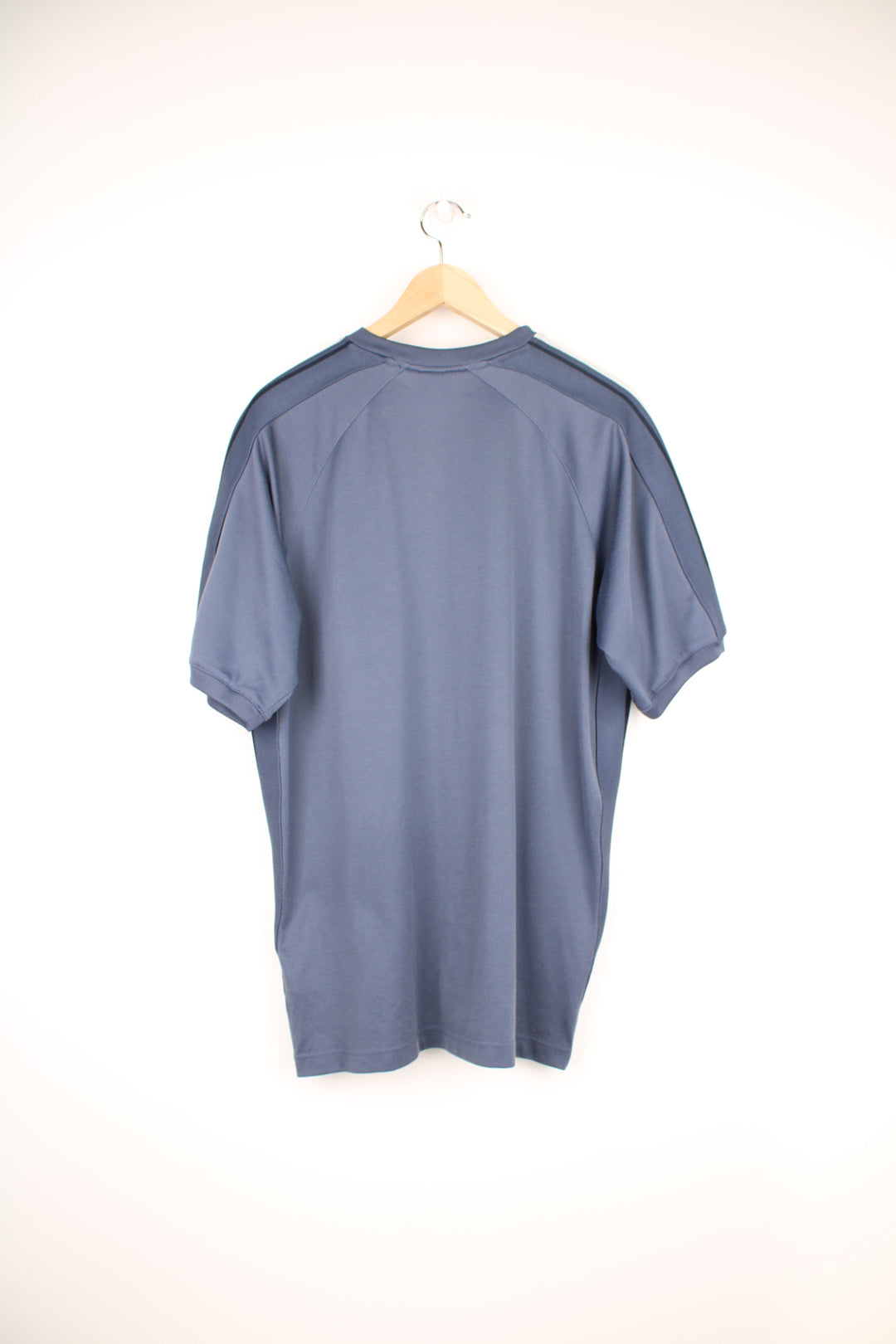 Nike Training Top in a blue and grey colourway with stripes going down the sides, v neck, cotton & polyester, and has the swoosh logo embroidered on the front.