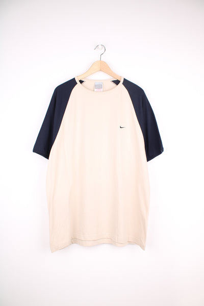Nike T-Shirt in a tanned and navy colourway, and has the swoosh logo embroidered on the front.