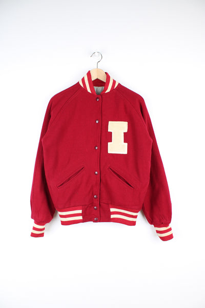 Vintage 60's Woollen Varsity Jacket in a red and white colourway, made in USA by TM Athletics, button up with side pockets, nylon lining, and has the initial 'I' embroidered on the chest.