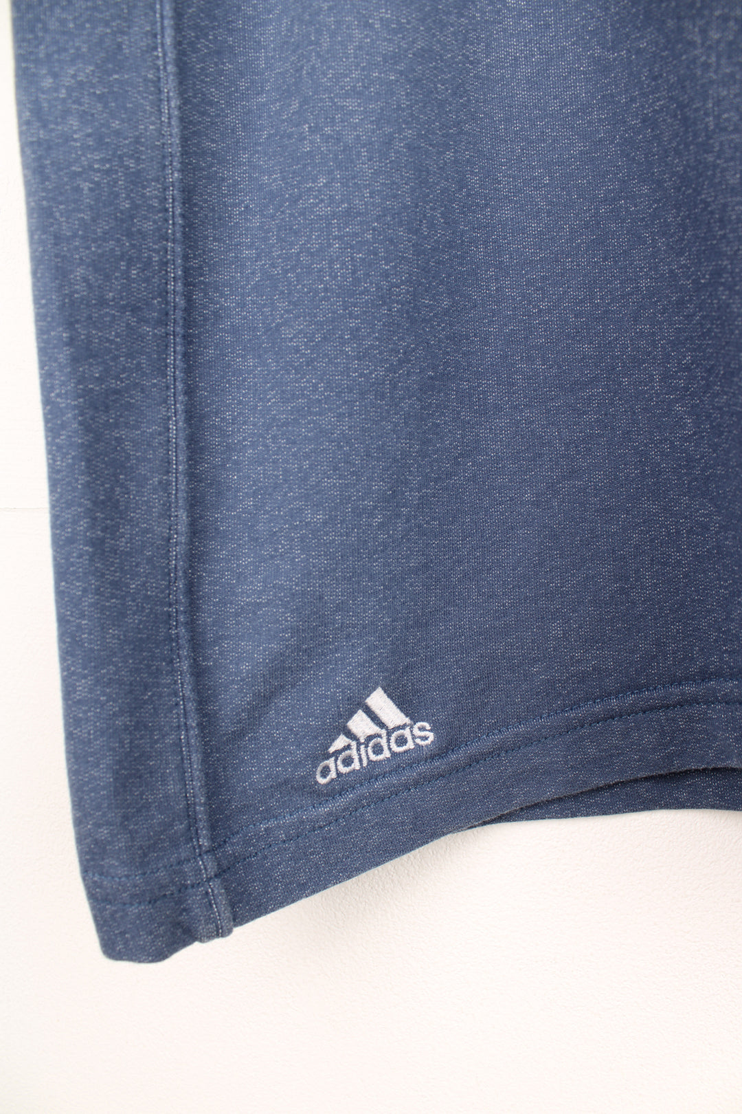 Adidas T-Shirt in a blue colourway, and has the logo embroidered on the front and left sleeve.