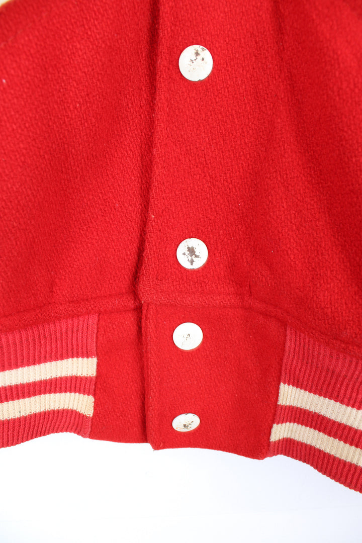 Vintage 60's Woollen Varsity Jacket in a red and white colourway, button up with side pockets, and has 'Mark' embroidered on the front as well as 'Westbrook Park B.C.' embroidered spell out on the back.