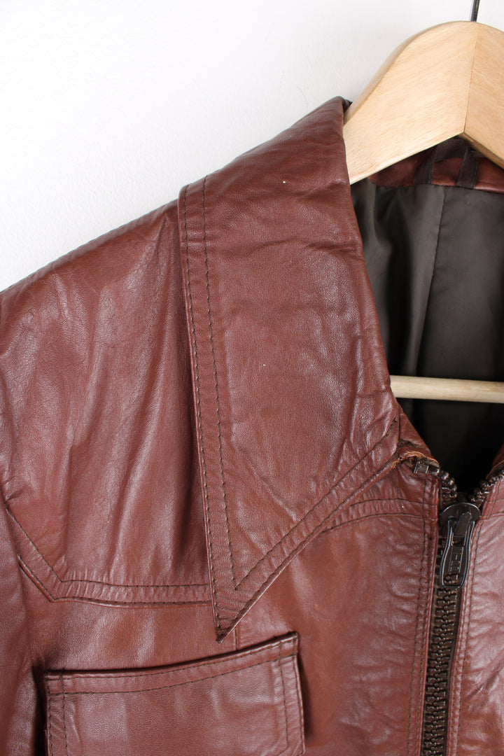 Vintage 70's Dagger Collar Leather Jacket in a brown colourway, zip up with multiple pockets.