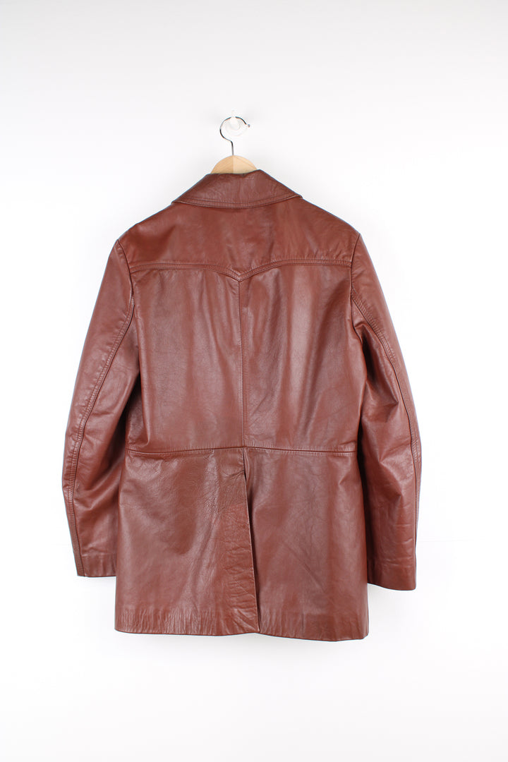 Vintage 70's Dagger Collar Leather Jacket in a brown colourway, zip up with multiple pockets.