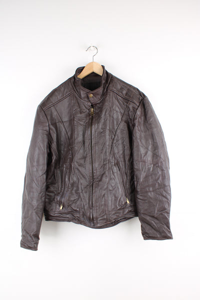 Vintage Leather Biker Jacket in a brown colourway, zip up with side pockets, and has a nylon lining.