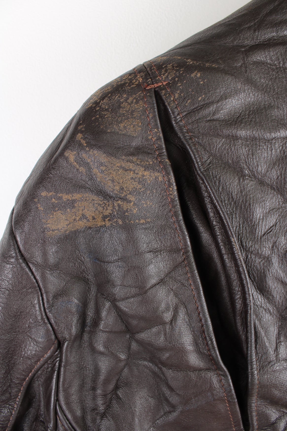 Vintage Leather Biker Jacket in a brown colourway, zip up with side pockets, and has a nylon lining.