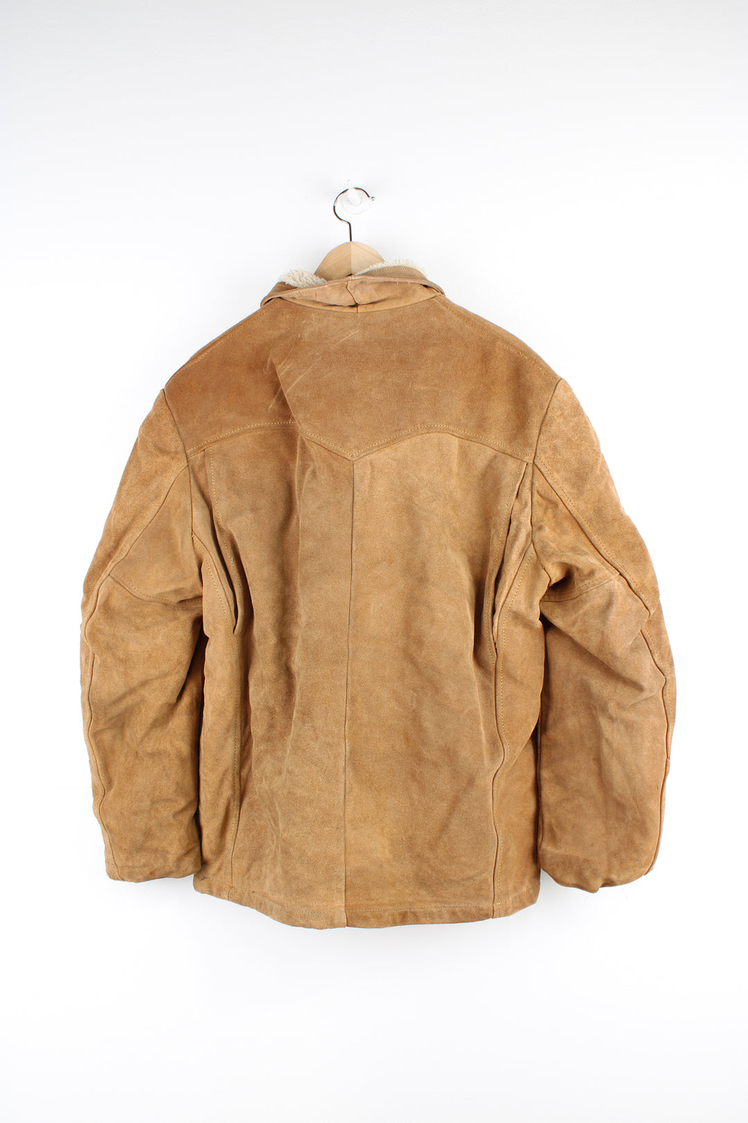 Vintage 70's Schott Bros Rancher Suede Coat in a tan colourway, sherpa lining, button up with big collar, and has side pockets.