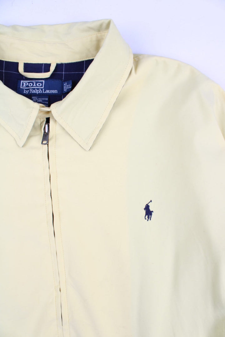 Vintage Polo Ralph Lauren Harrington Jacket in a yellow colourway. Zips up and has side pockets, and the logo embroidered on the front.