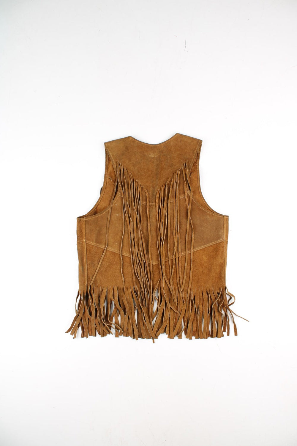 Vintage Western Suede Fringe Vest in a brown colourway. Loose vest which has no closure, fringe tassels on the front and back.