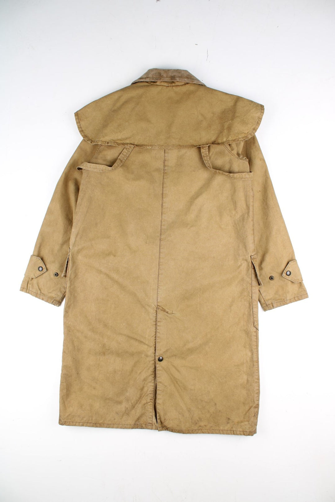 Vintage Polo Ralph Lauren Duster Trench Coat in a tan colourway. Zips and buttons up, has double pockets, corduroy collar, and has a cape feature on the back.