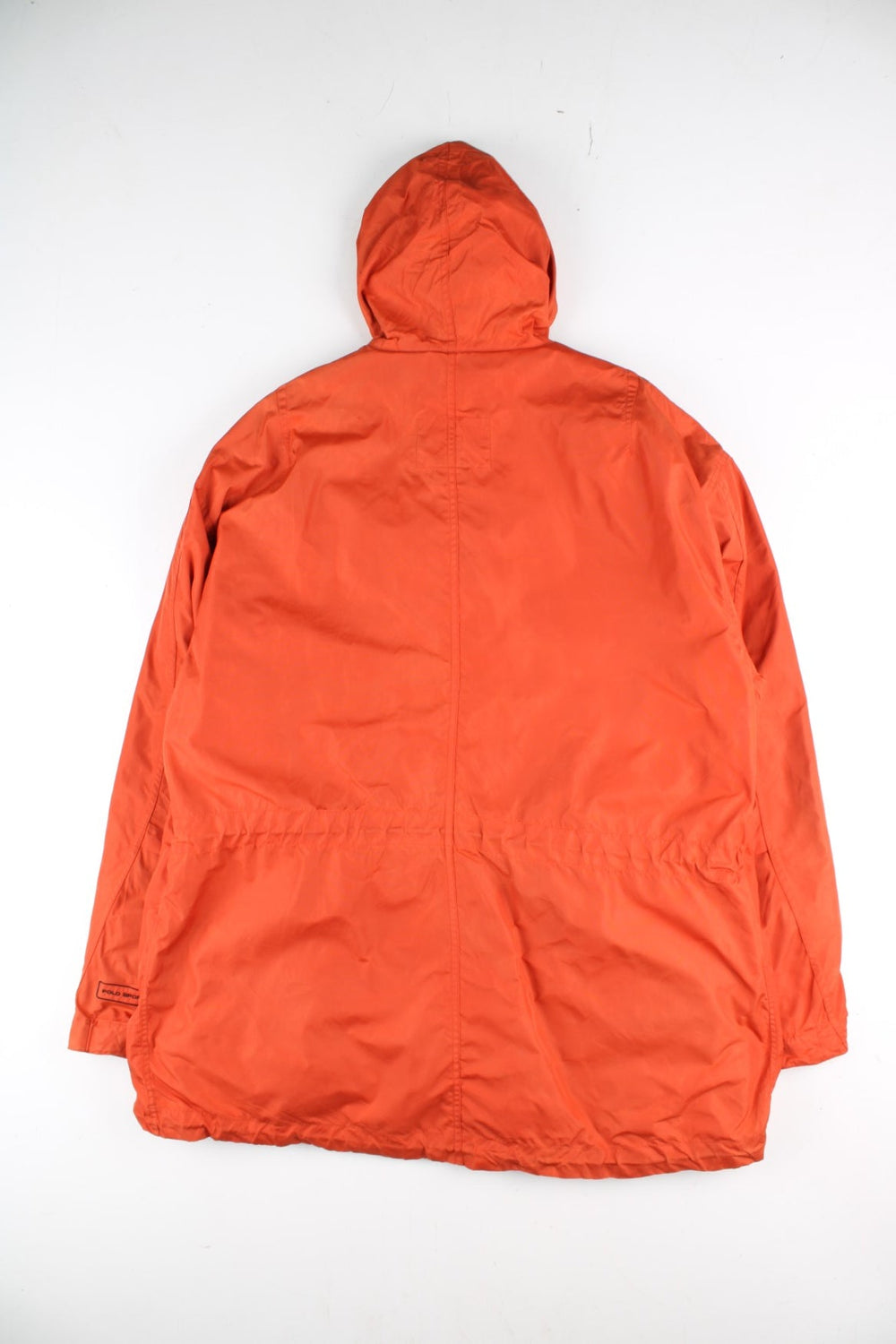 Vintage Polo Sport Ralph Lauren Mountain Parka Coat in a orange colourway. Zips up and has side pockets, insulated with a detachable fleece lining, hooded, and has the logo embroidered on the cuff of the left sleeve.