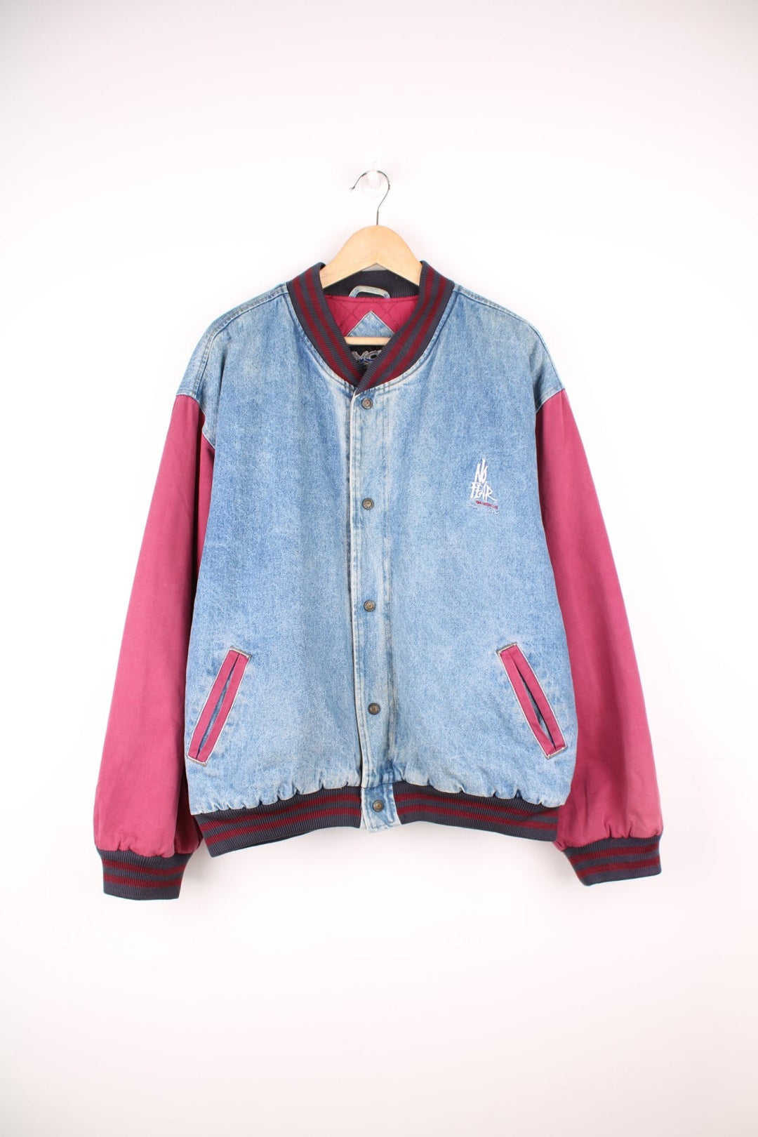 90s No Fear quilted denim varsity/bomber jacket in blue and burgundy red. Features embroidered logo on the chest. 