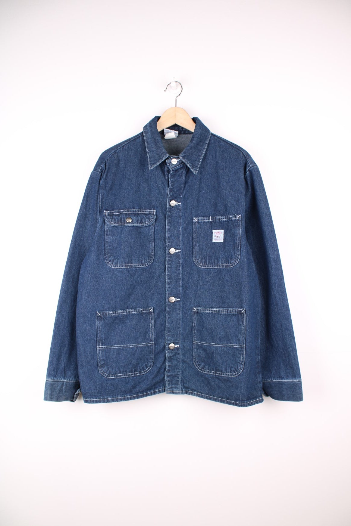 Vintage Pointer Brand denim chore jacket. Features multiple pockets and embroidered logo.