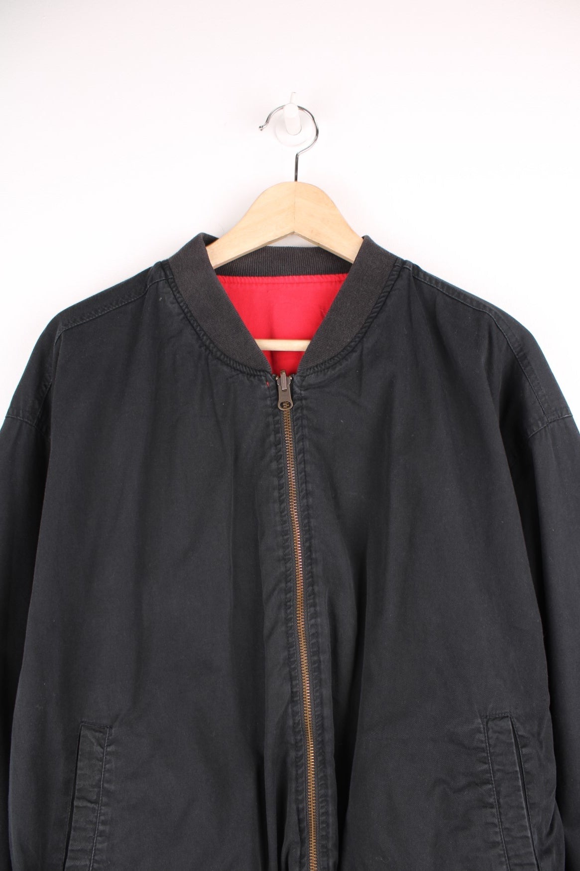 Vintage Marlboro reversible bomber jacket in red and black. Features embroidered spell out logo on the back, and embroidered "M" on the sleeve. 